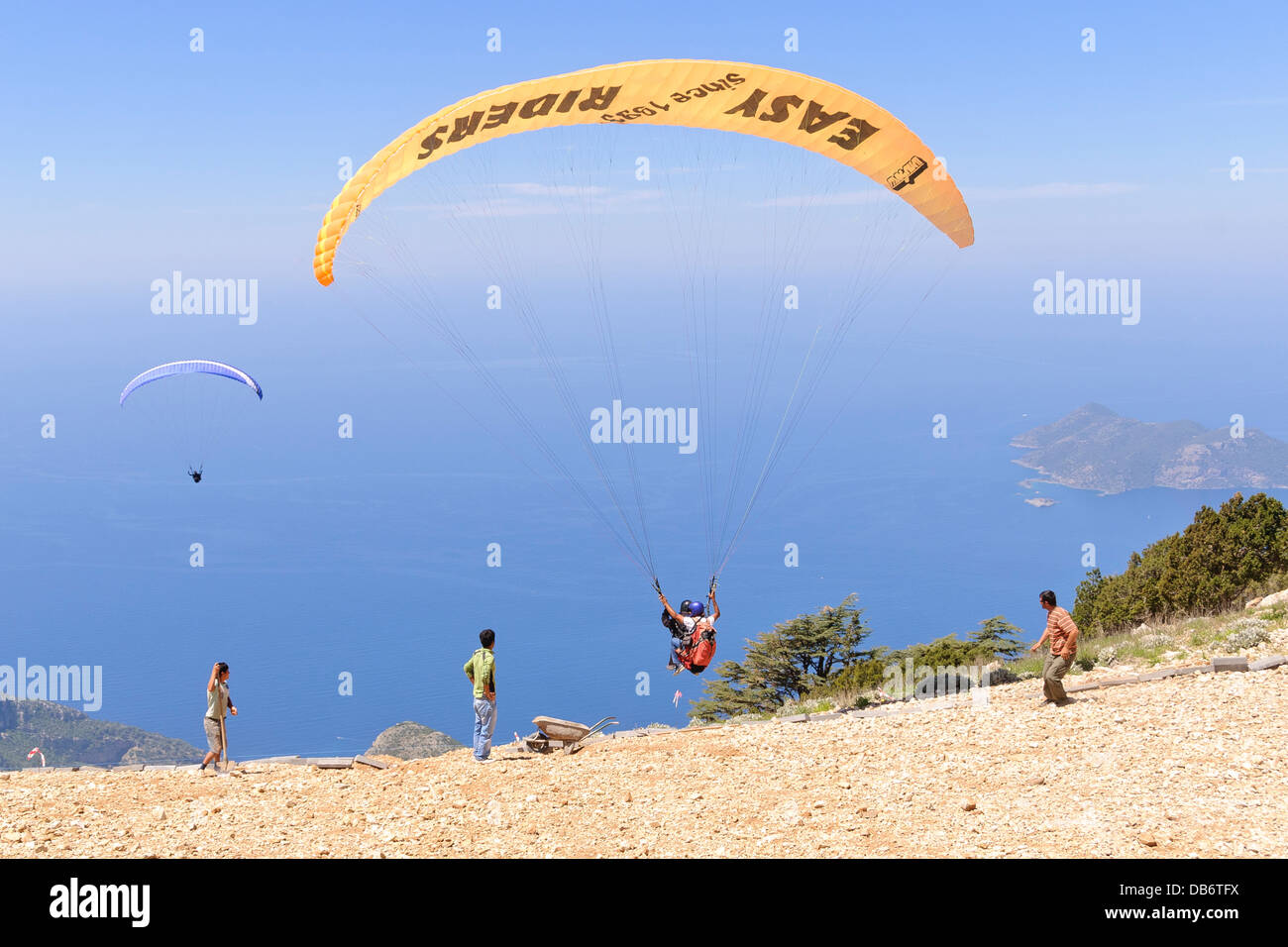 Oludeniz, Turkey. Tandem paragliding from Babadag Mountain. Stock Photo
