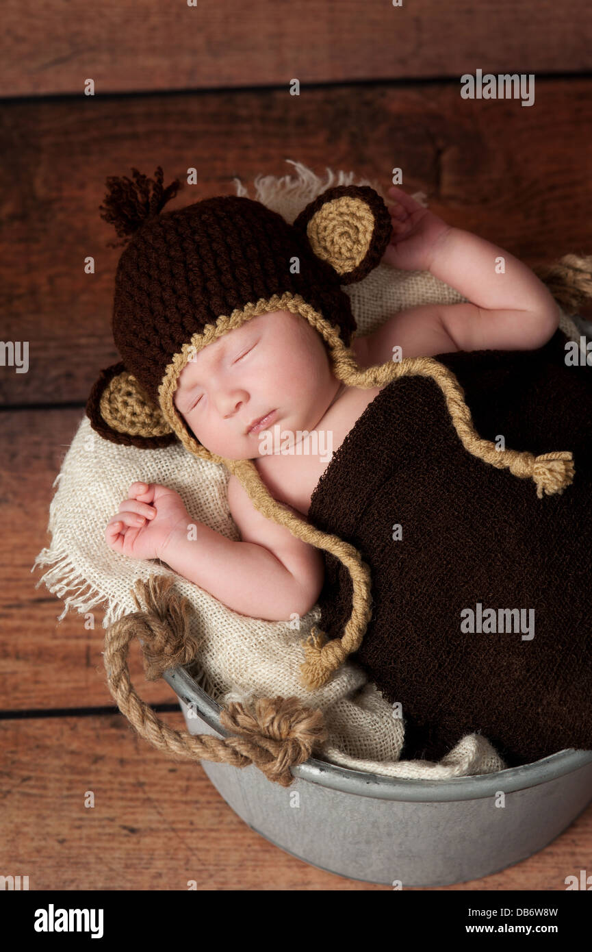 Newborn Baby in a Monkey Costume Stock Photo Alamy
