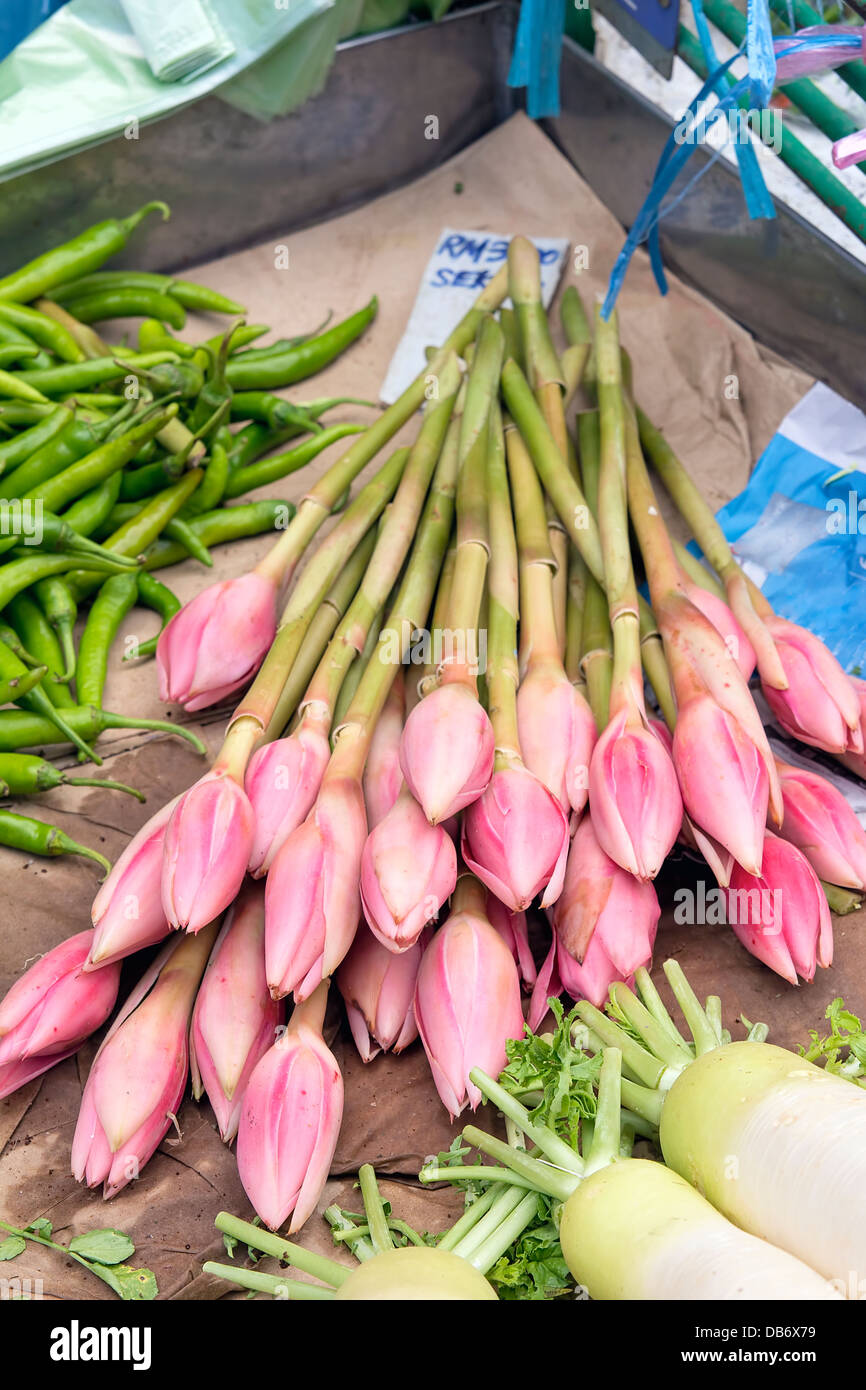 Banana Flower Blossom Bud for Sale at Wet Market Fruits and Vegetables Stall in Southeast Asia Stock Photo