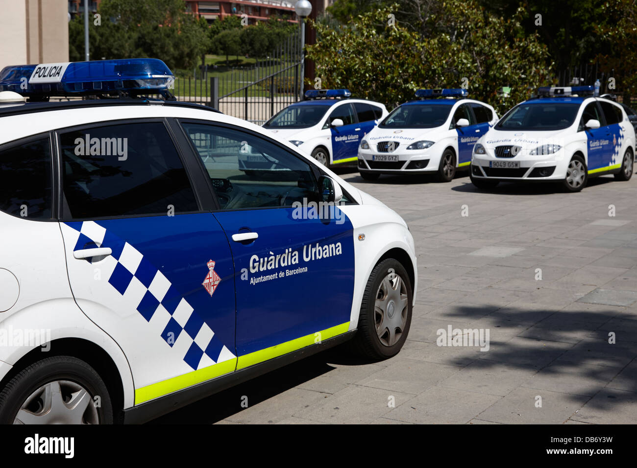 policia guardia urbana city police patrol cars Barcelona Catalonia Spain Stock Photo