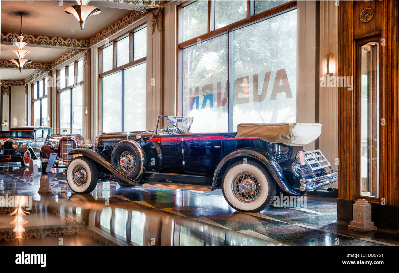 A row of Auburns on the showroom floor of The Auburn Cord Duesenberg Museum,Auburn Indiana Stock Photo