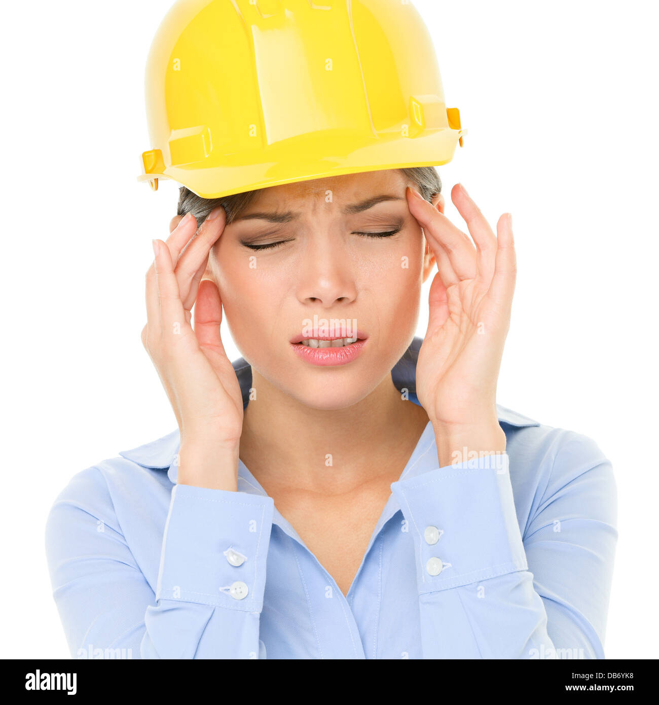 Engineer or architect woman worker having headache migraine stress
