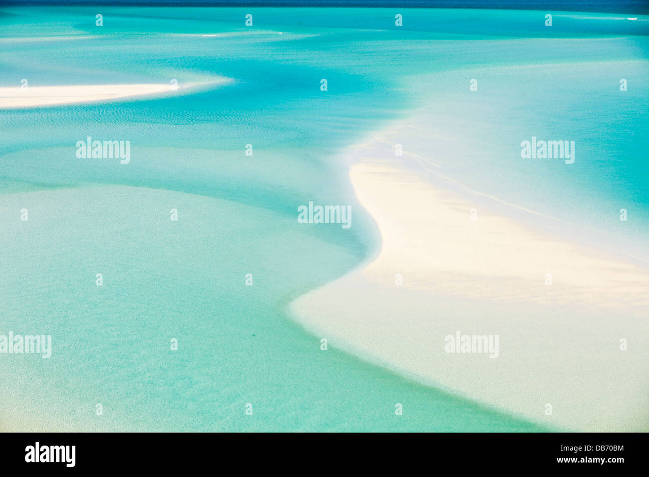 The shifting white sands and turquoise waters of Hill Inlet on Whitsunday Island. Whitsundays, Queensland, Australia Stock Photo