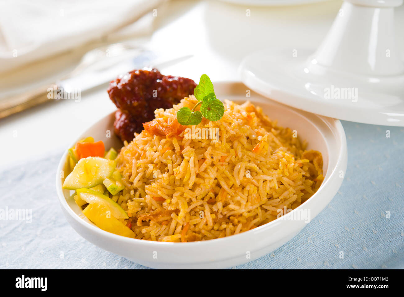 Biryani chicken rice cooked in arab style tajine with traditional india ...