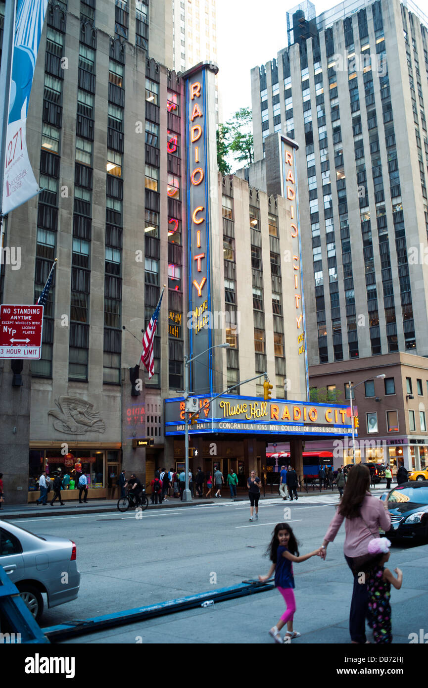 Woman and child walking in front of Radio City Music Hall in New York City Stock Photo