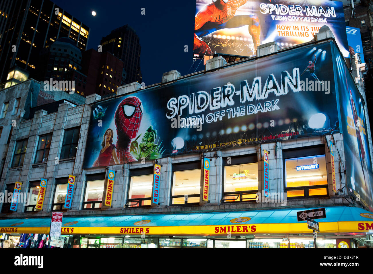 Spider-man 'Turn Off The Dark' on Broadway advertisement lighted Billboards, Times Square New York City Stock Photo