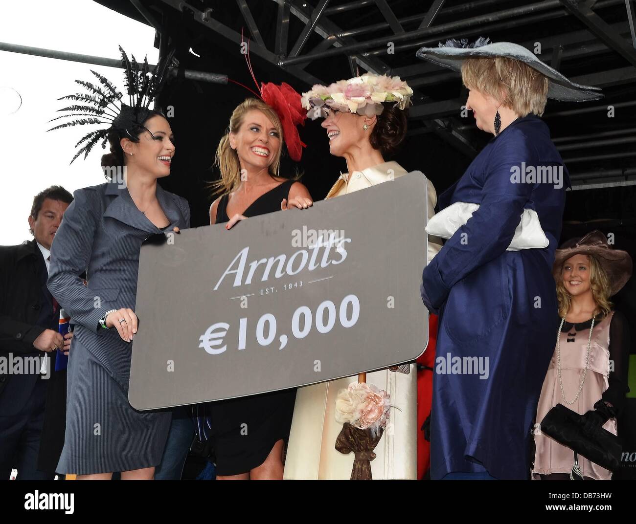 Grainne Seoige & Maria Cullen Hanley Maria Cullen Hanley from Meath won Best Dressed Lady and 10,000 Euro voucher from Arnotts at Punchestown Ladies Day final, Punchestown Racecourse, Ireland - 06.05.11. Stock Photo