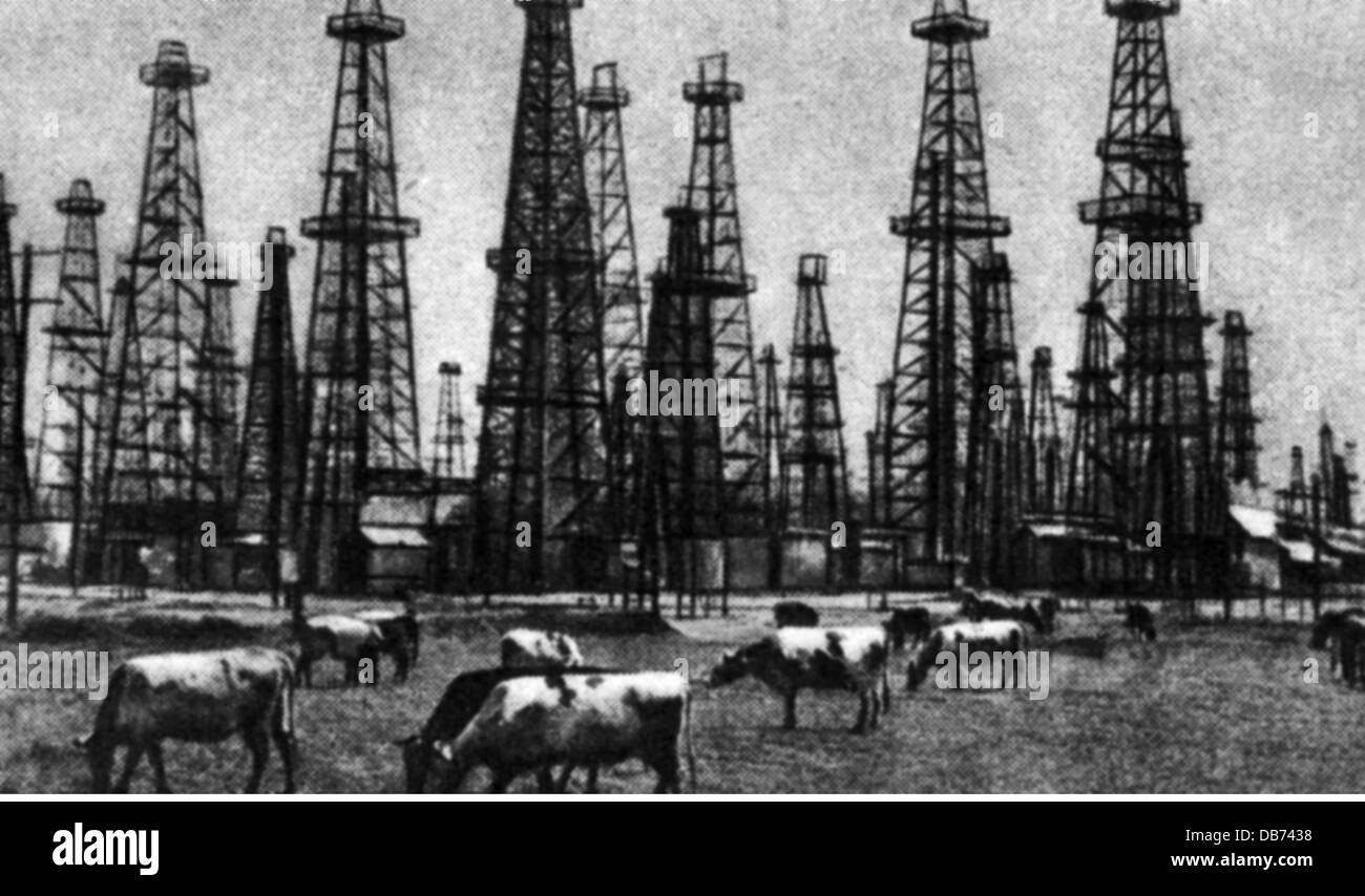 energy,crude oil,drilling derrick,Texas,late 19th century,19th century,USA,United States of America,drilling derrick,wellhead,boring tower,boring trestle,drill tower,drill rig,drilling derricks,wellheads,boring towers,boring trestles,drill towers,drill rigs,oil extraction,oil production,crude oil,crude naphtha,raw oil,base oil,rock oil,crude petroleum,oil,resource,assign resources,raw material,raw materials,crude materials,oil boom,cattle,cows,cow,agriculture,farming,boom,industrialization,industrialisation,historic,h,Additional-Rights-Clearences-Not Available Stock Photo