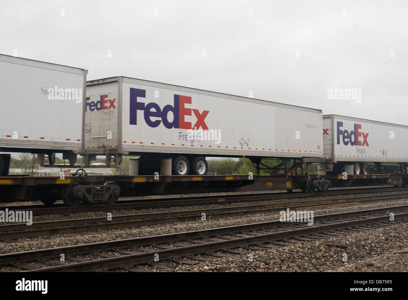 FedEx piggyback truck trailer on BNSF freight train at Mulvane Kansas