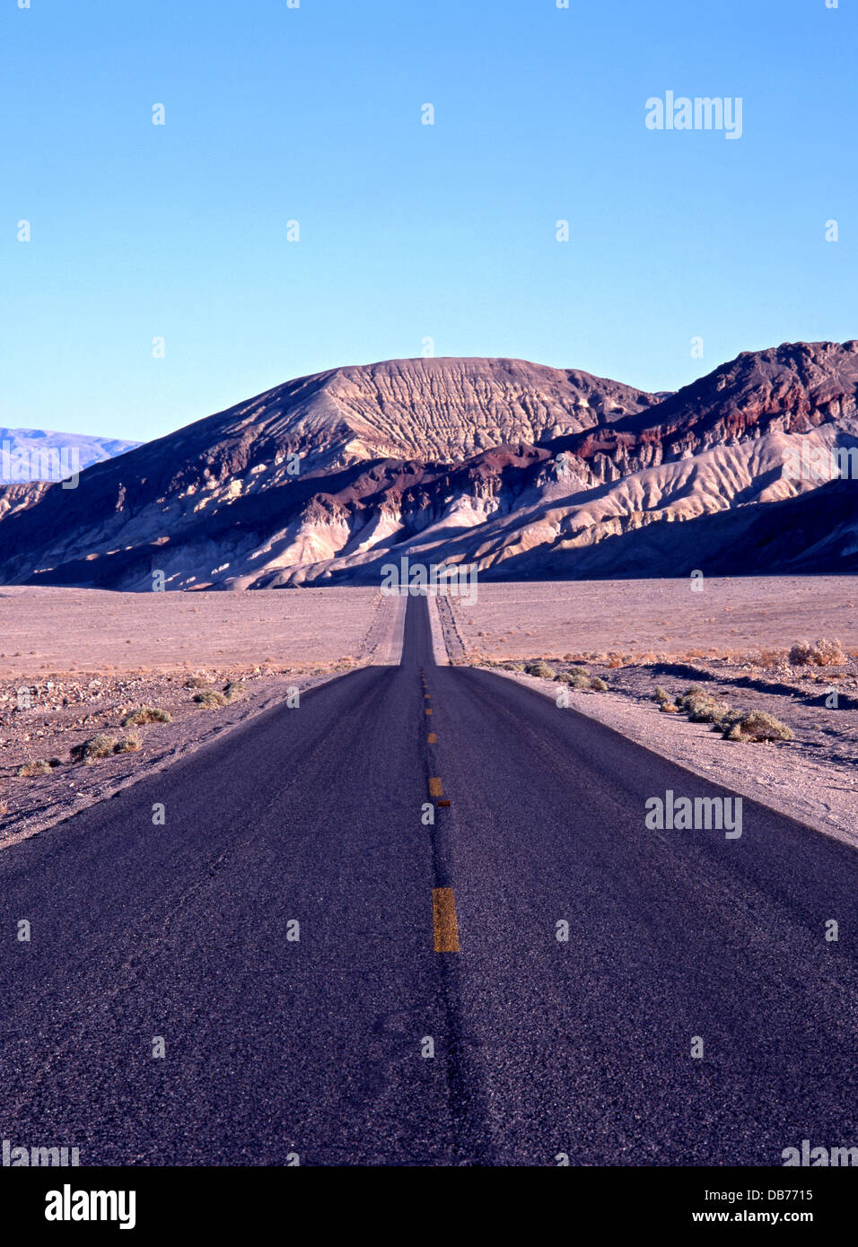 Long straight road through Death Valley, California, USA Stock Photo