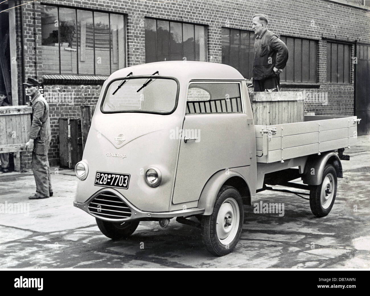 transport / transportation,car,vehicle variants,Tempo Wiking,pickup truck,load area,2 cylinder two-stroke engine,made by Vidal & Sohn Tempo plant in Hamburg-Harburg,the Wiking was produced from 1953-55,workers loading boxes,image by manufacturer,Germany,1953,two-stroke,small lorry,carriage,transporter,transporters,light delivery truck,delivery vans,light delivery trucks,delivering,deliver,utility vehicle,commercial vehicle,utility vehicles,commercial vehicles,car advertising,federal republic,economic miracle,economic miracles,Made,Additional-Rights-Clearences-Not Available Stock Photo