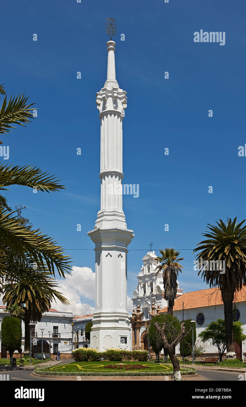 tower or obelisk in front of Hospital Santa Barbara, colonial buildings, Sucre, Bolivia, South America Stock Photo