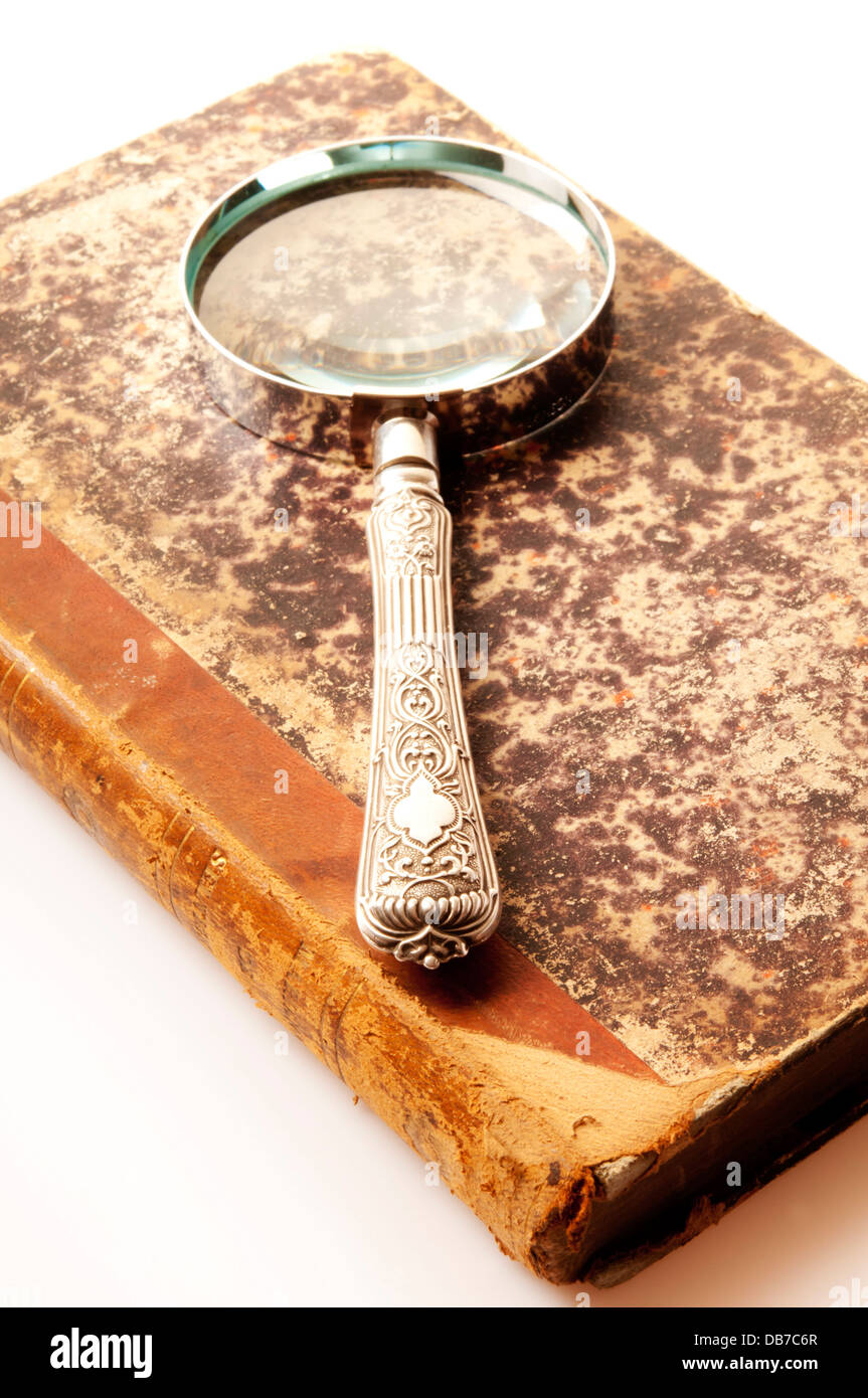 magnifying glass and book Stock Photo