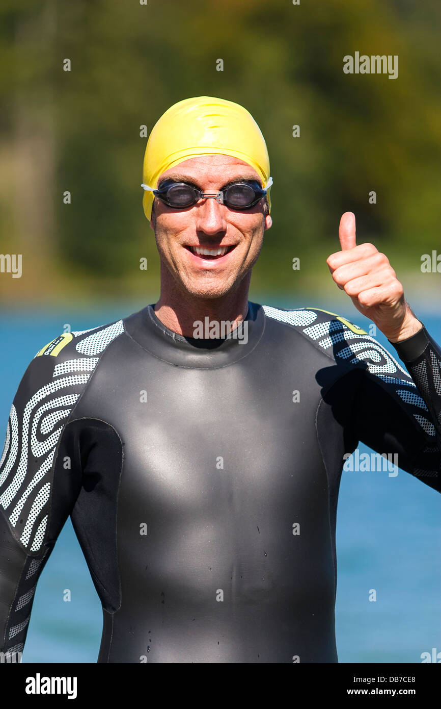 Male triathlete M39 before swimming training, Germany, Europe Stock Photo