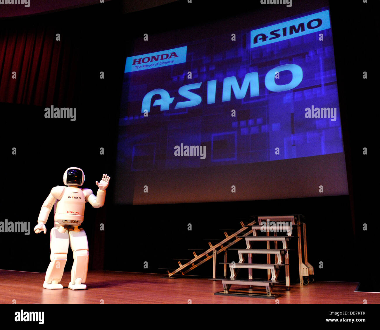 Honda's ASIMO robot performs walking, running, dancing, climbing stairs, and kicking a soccer ball at a special presentation at Ontario Science Centre. Toronto, Canada - 13.05.11 Stock Photo