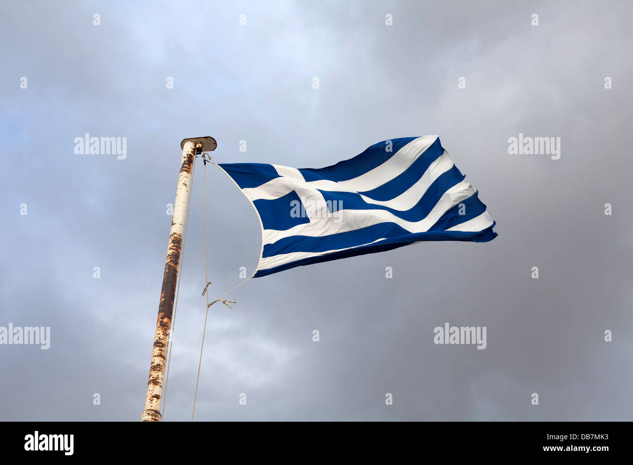 Greek flag flying in stormy  conditions in Athens, Greece Stock Photo