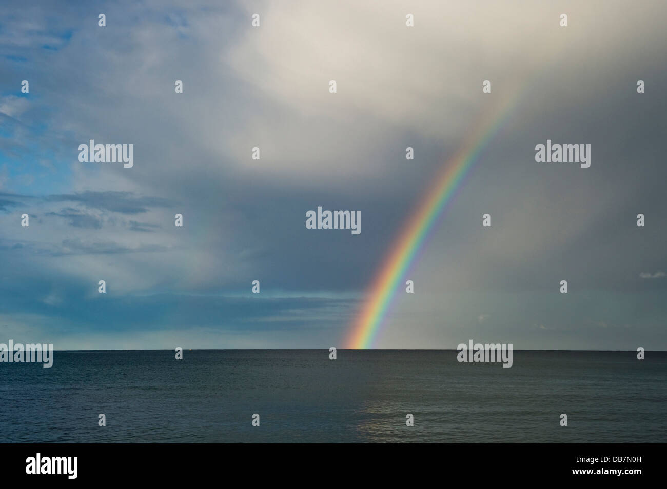 Rainbow over the sea Stock Photo