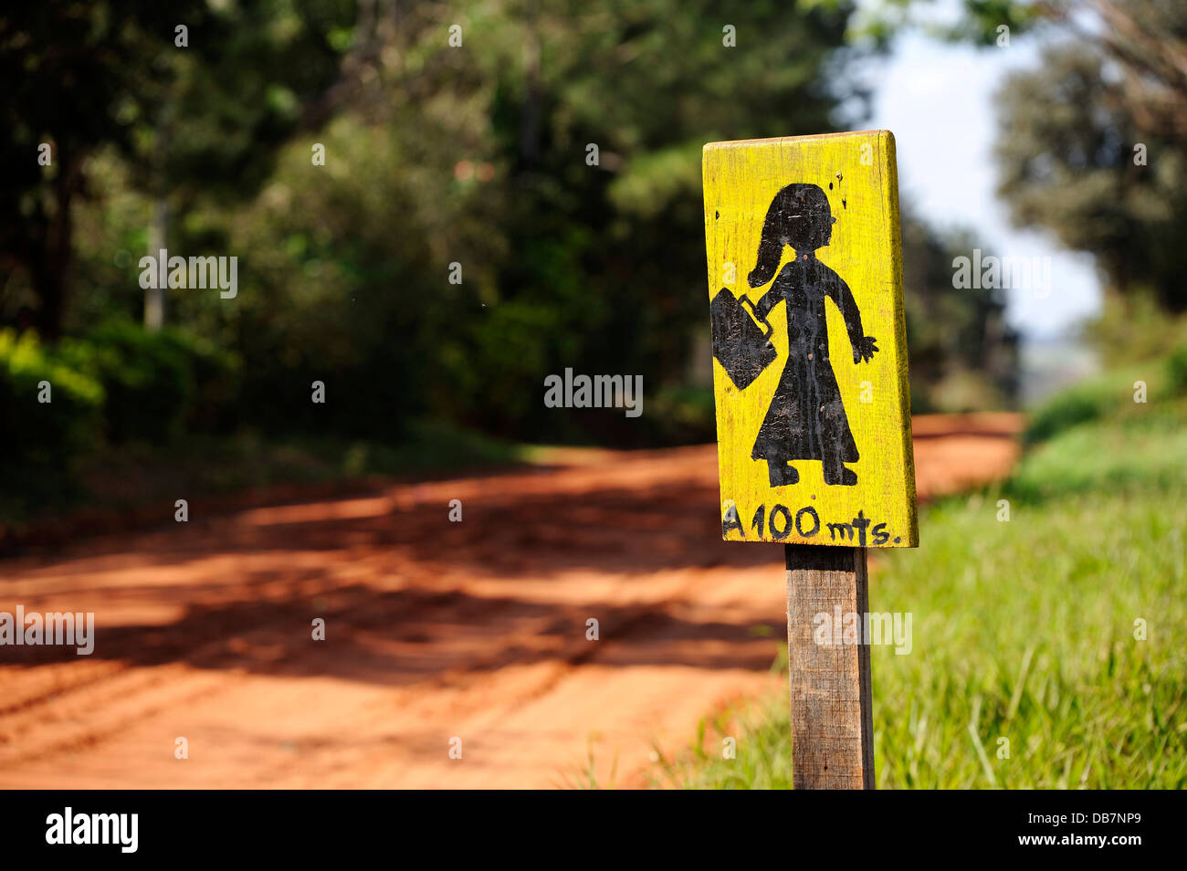 Hand painted wooden sign 'Caution, schoolchildren' in a Mennonite community Stock Photo