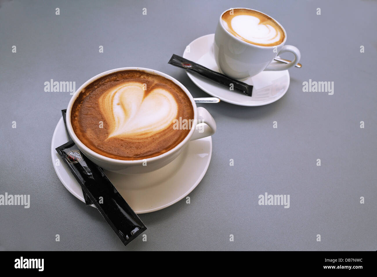 Cappuccino cup with chocolate heart shape in white cup outdoor, Stock  image