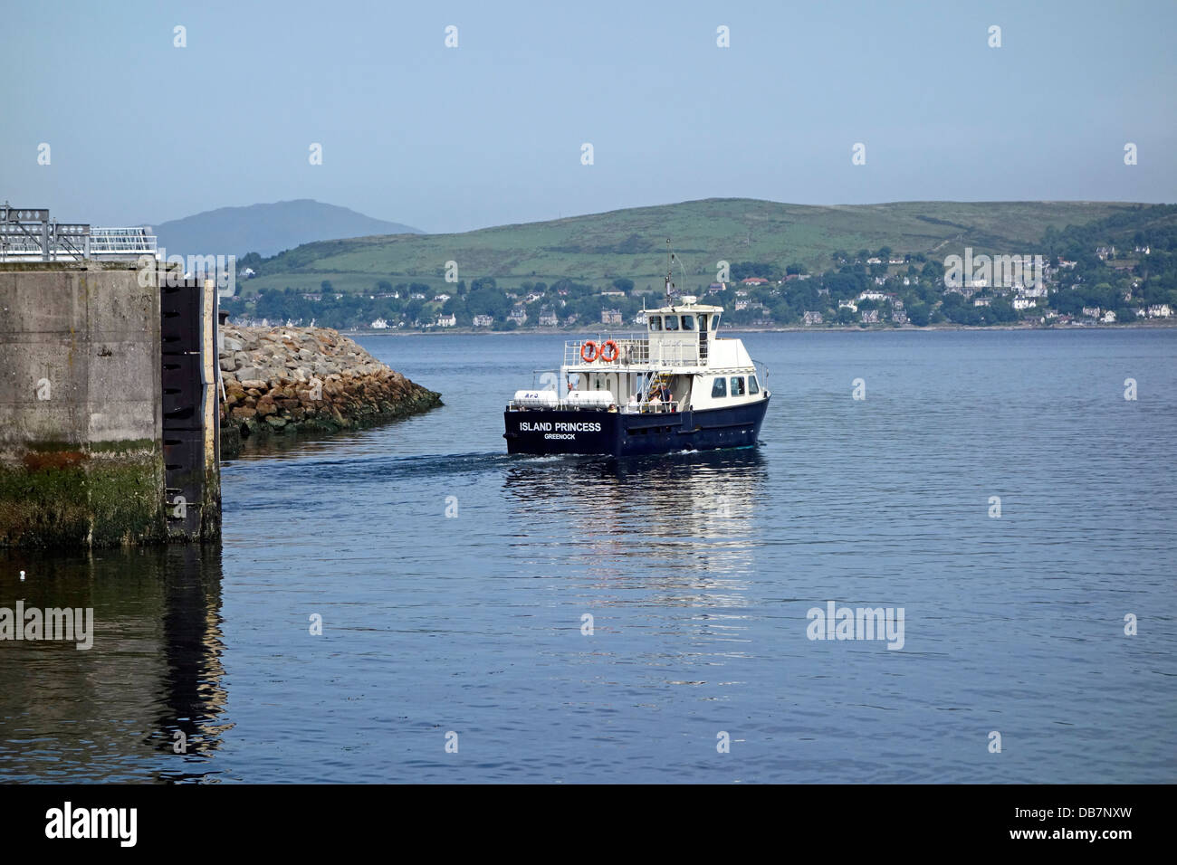 Small passenger ferry Island Princess is leaving Gourock harbour in Scotland for Kilcreggan across River Clyde Stock Photo
