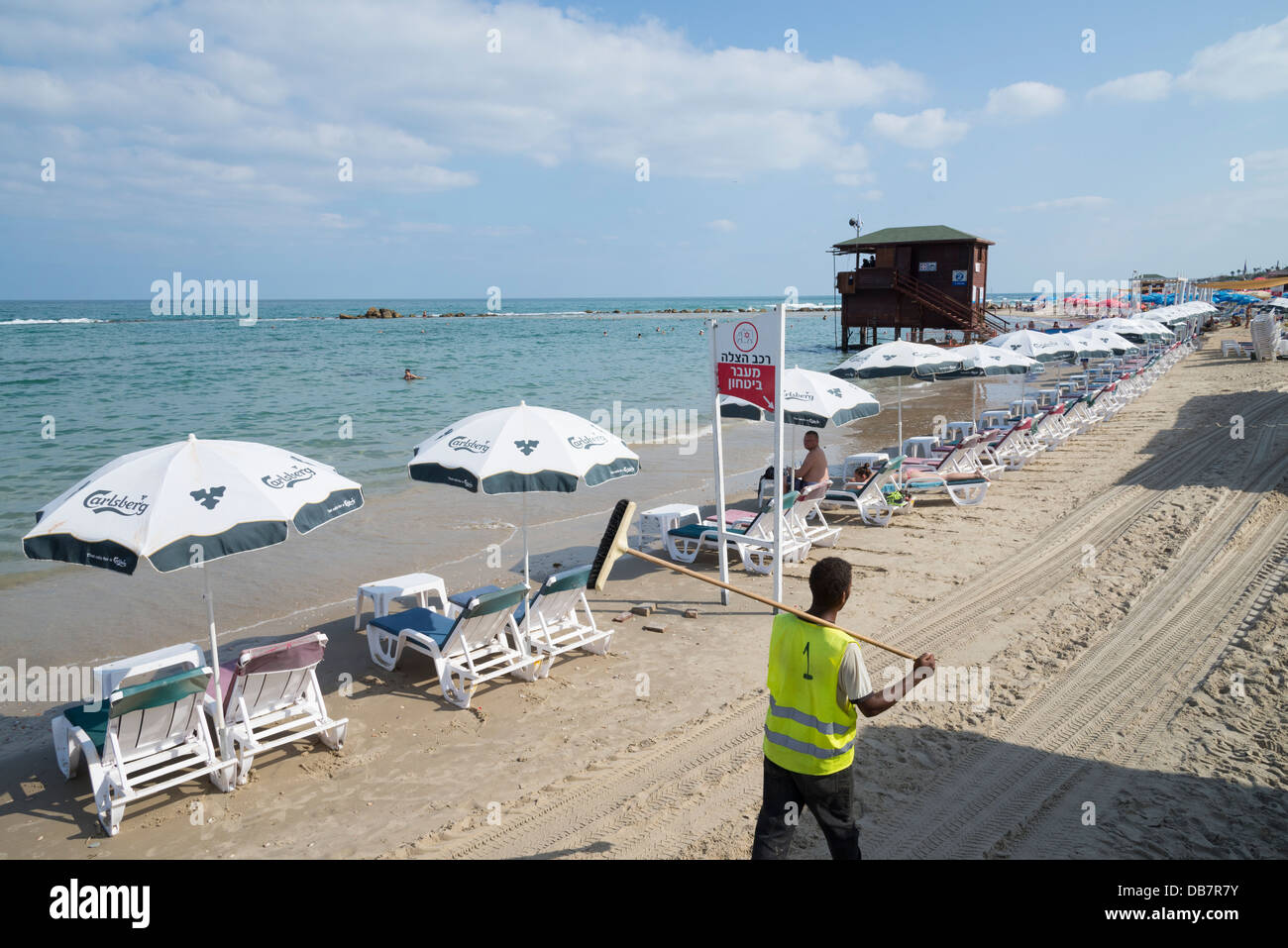 Sand beach Boqeh with sunbeds and umbrellas. Bat Yam. Israel. Stock Photo
