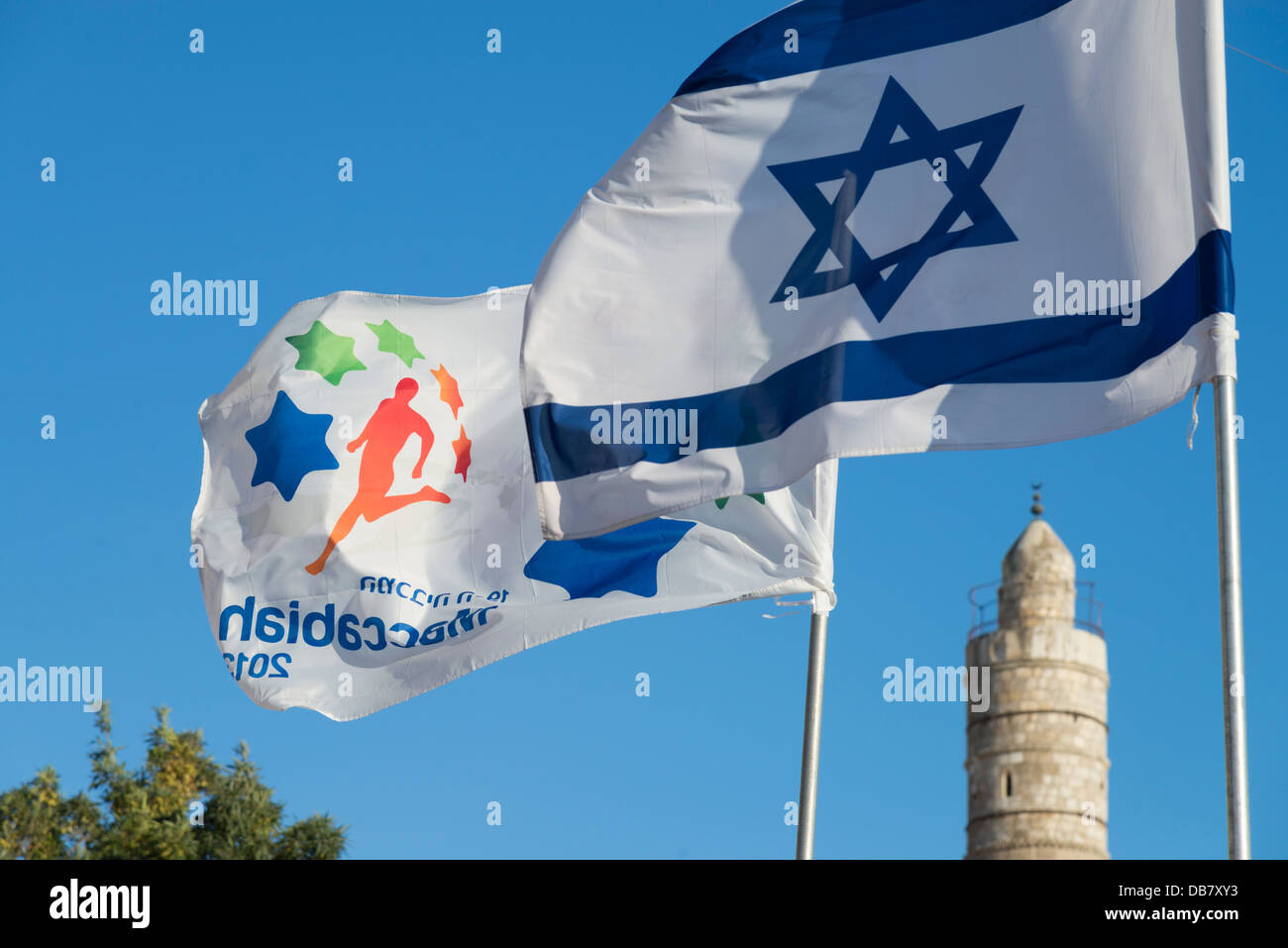 Maccabiah sport competiion and Israeli flags with muezzin in background. Jerusalem Old City. Israel Stock Photo