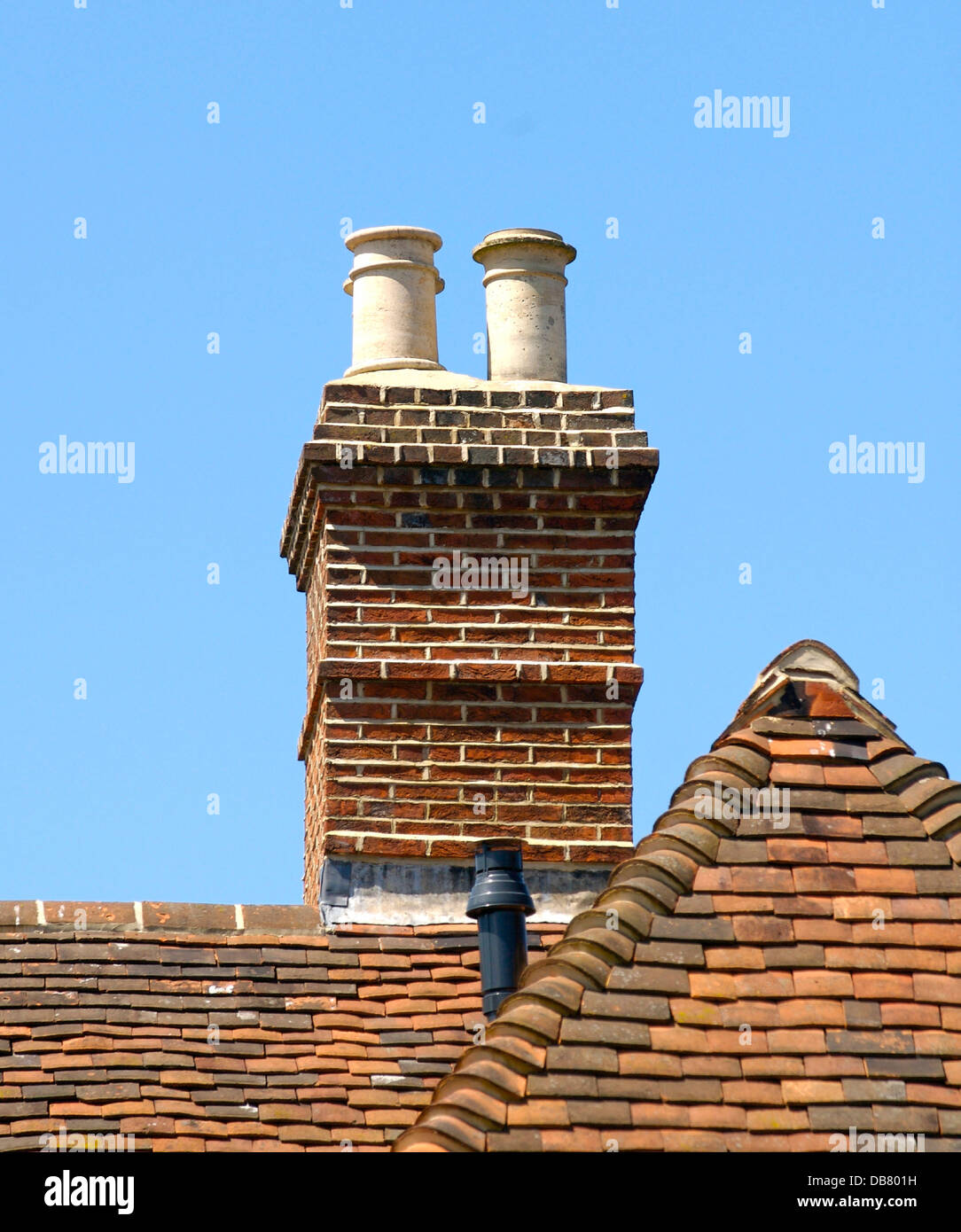 Old chimney pots on a roof in UK Stock Photo Alamy
