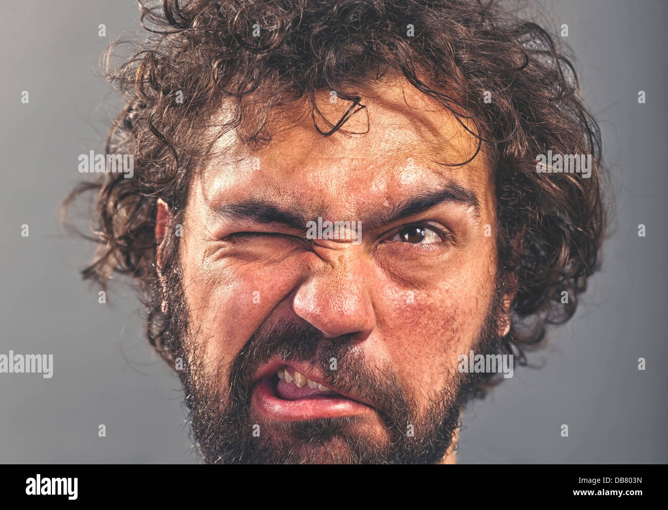 Weird guy making a crazy face Stock Photo
