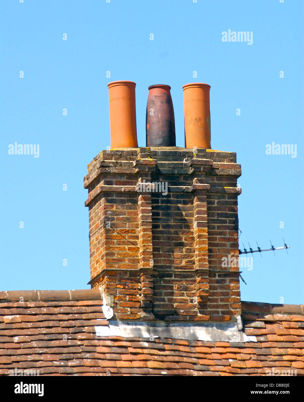 Old chimney pots on a roof in UK Stock Photo Alamy