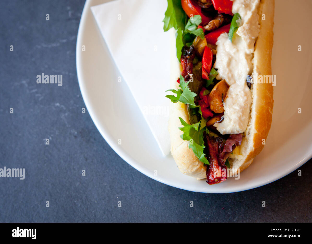 hummus and oven roasted vegetable baguette Stock Photo