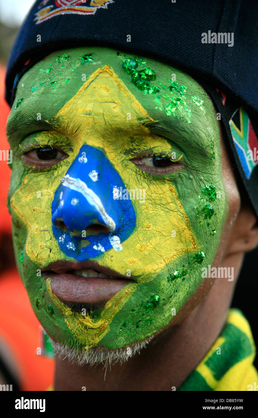 Brazilian soccer fan with painted face at 2010 FIFA World Cup Soccer in South Africa Stock Photo