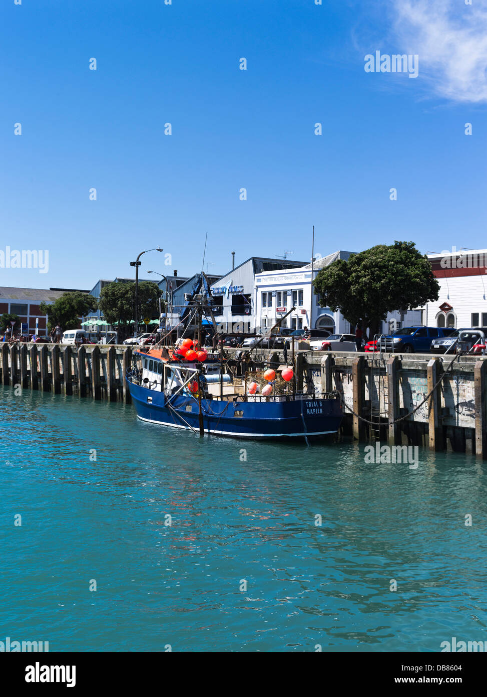dh Napier Inner Harbour NAPIER NEW ZEALAND Fishing boat berthed alongside harbourside road Stock