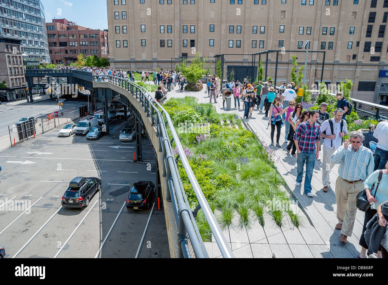 People enjoying the sunshine on the High Line park in New York City ...