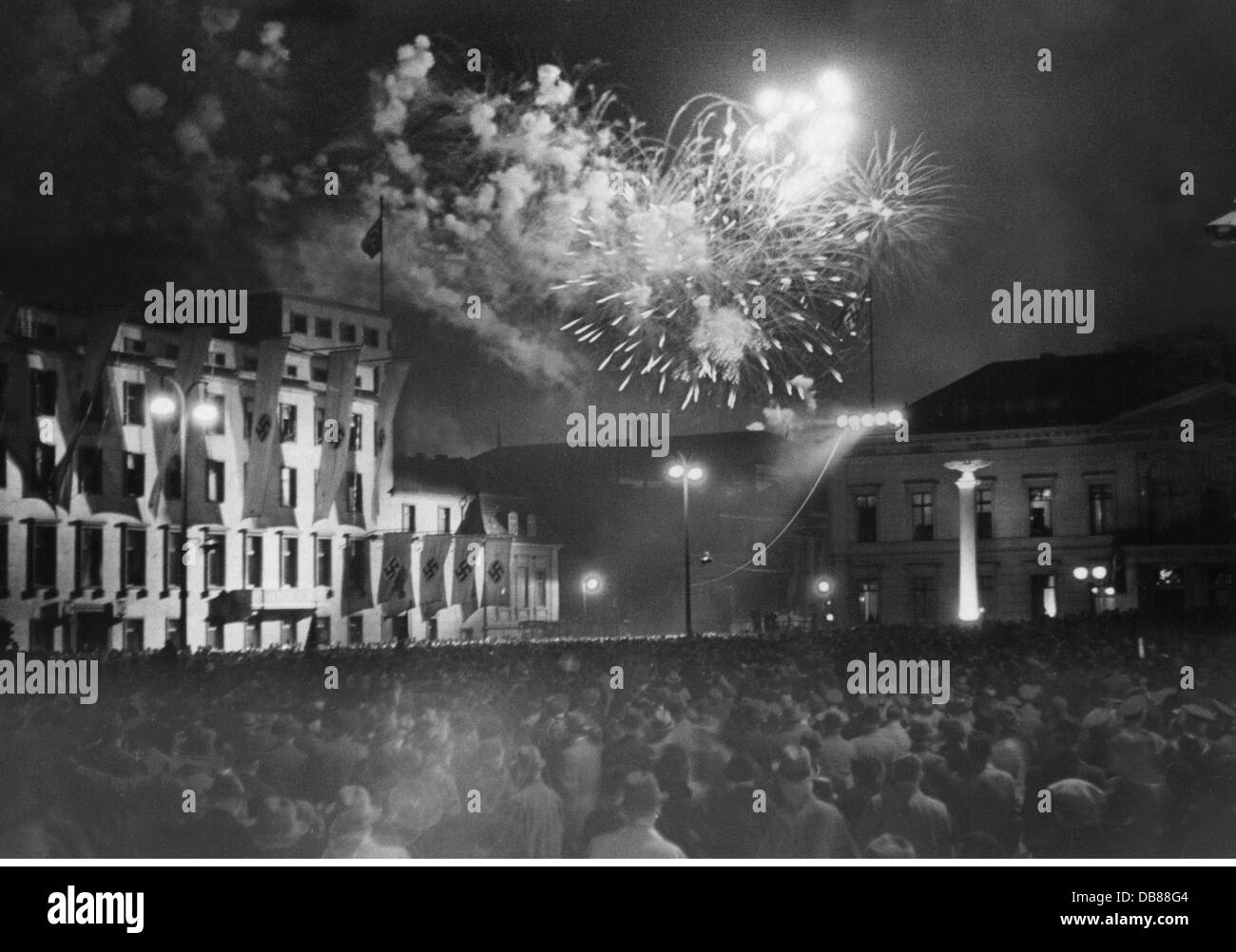 Nazism / National Socialism, politics, Axis Rome-Berlin, journey of Chancellor of the Reich Adolf Hitler to Italy, 3. - 10.5.1938, return, reception in Berlin, 10.5.1938, fireworks on Wilhelmplatz, crowd, crowds, crowds of people, axis Rome - Berlin, people, state visit, state visits, Germany, German Reich, Third Reich, 1930s, 30s, 20th century, politics, policy, historic, historical, Additional-Rights-Clearences-Not Available Stock Photo