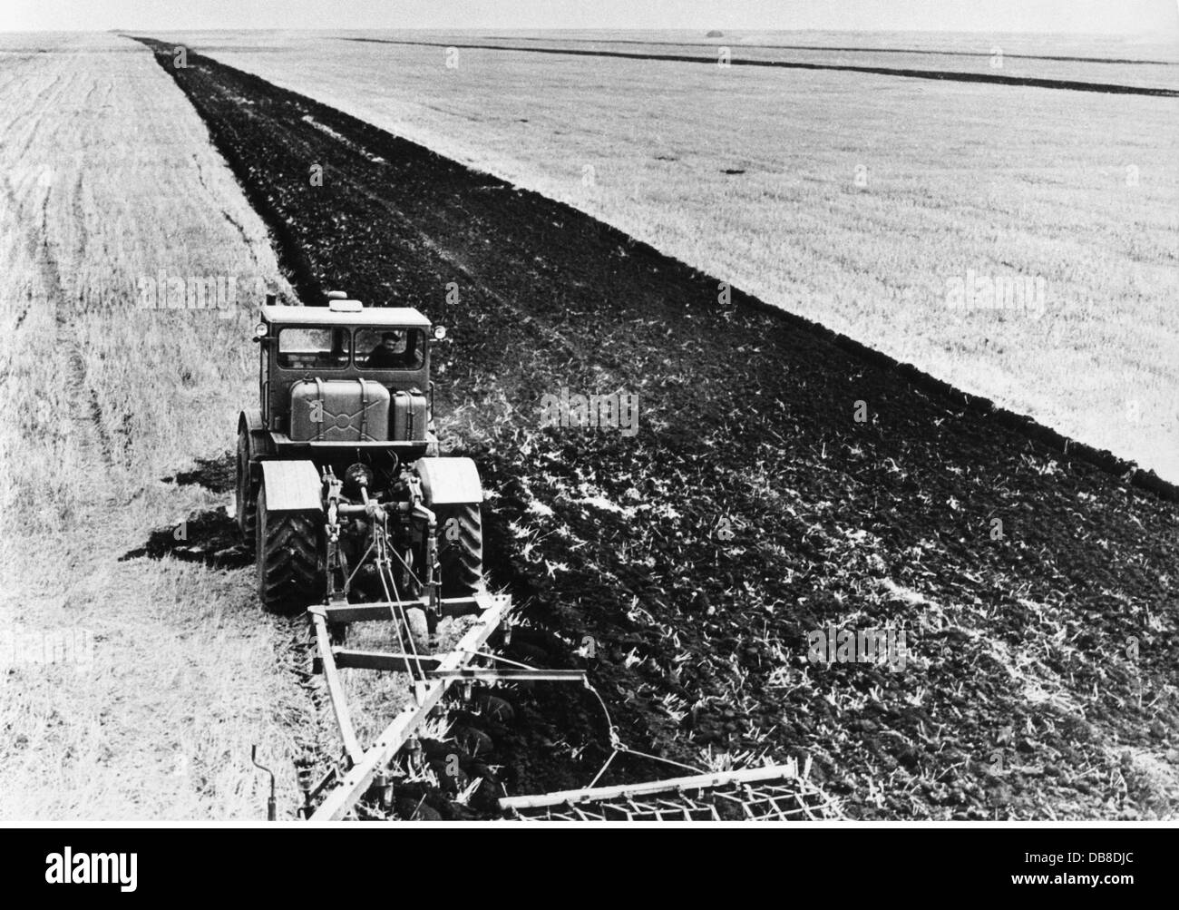 agriculture, machines, tractor with plough, Kazakhstan, 1950s, Additional-Rights-Clearences-Not Available Stock Photo