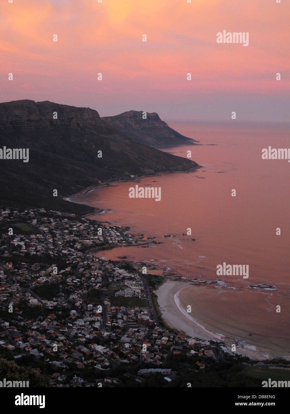 Twelve Apostles and sunrise near Camps Bay and Table Mountain, Cape Town Stock Photo
