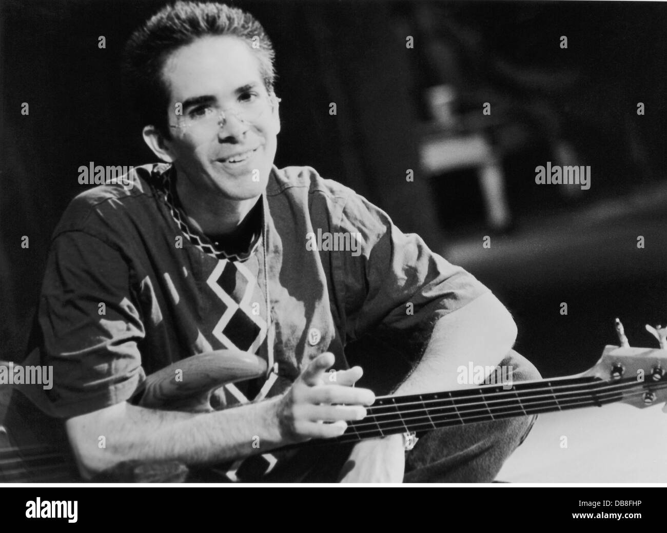 Harkness, Steve, British musician, bass guitarist, half length