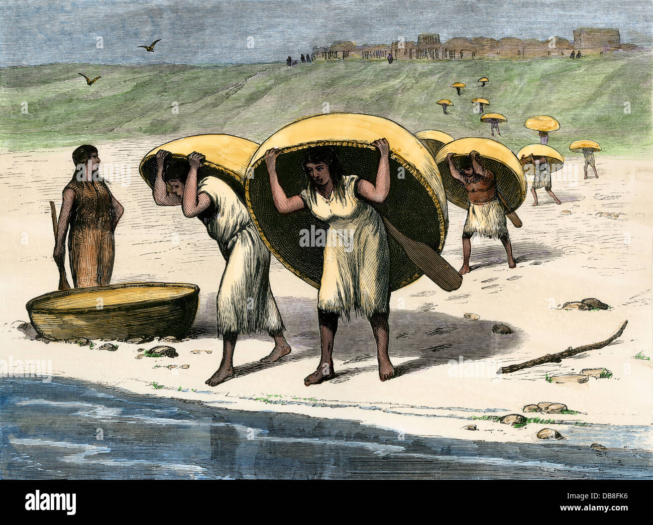 Mandan women carrying their bull-boats to the Missouri River, Fort Berthold ND, 1870s. Hand-colored woodcut Stock Photo