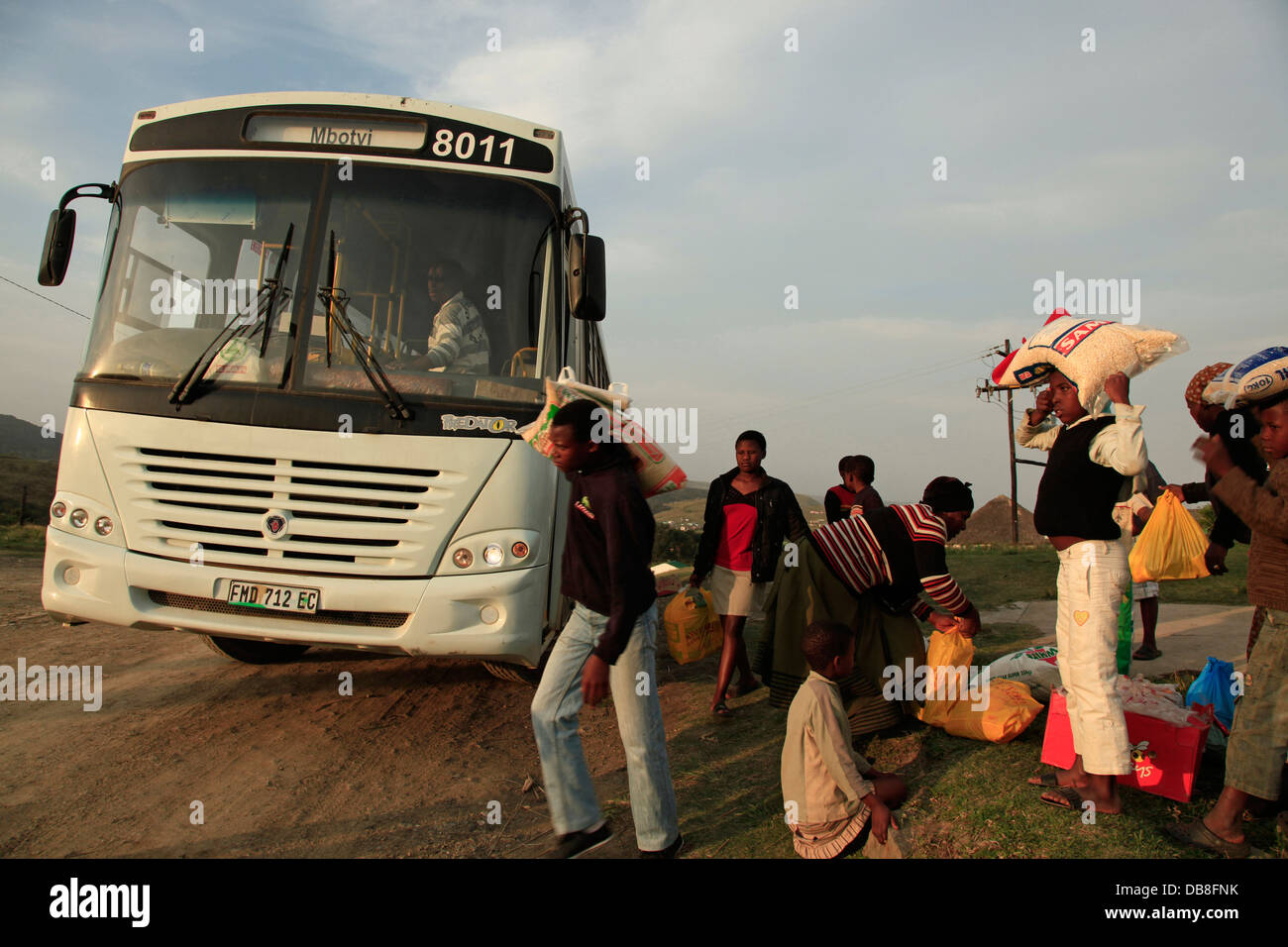 local people carrying sacks of food board a local bus at Mbotyi on the Wild  Coast, Transkei Stock Photo - Alamy
