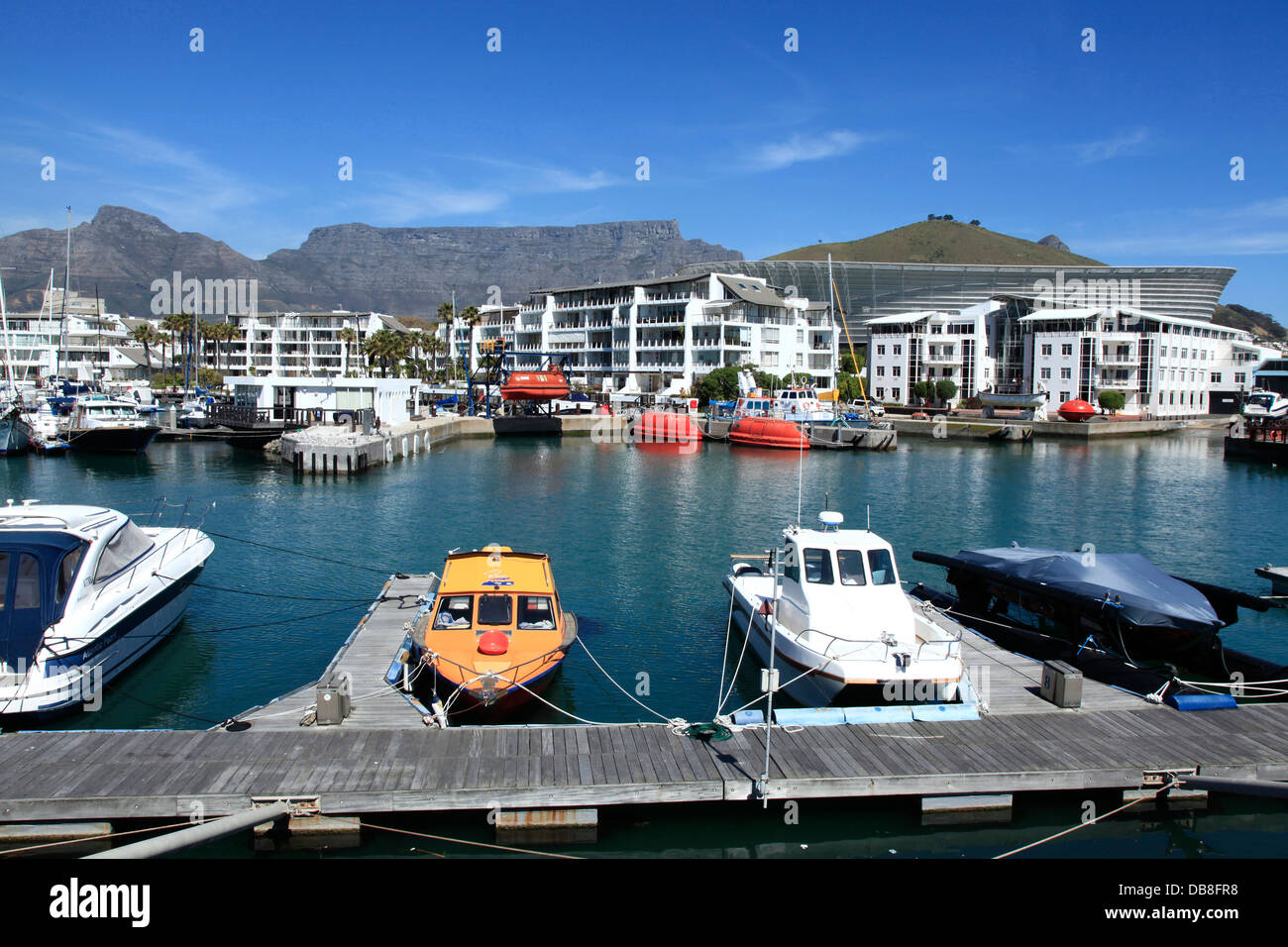 boats docked in Granger Bay, Cape Town with Table Mountain Stock Photo