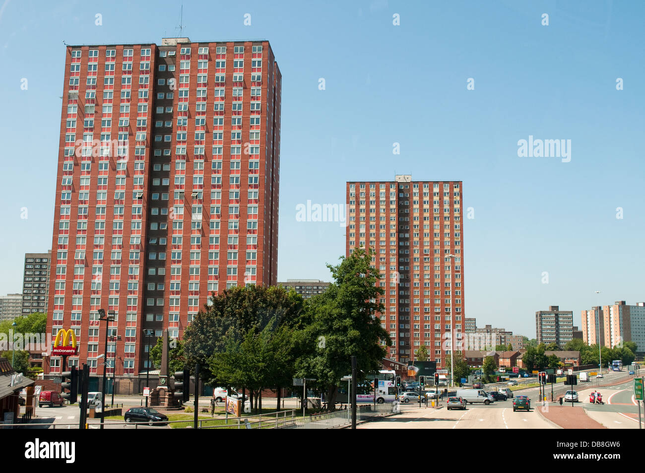 Red tower blocks on A6 motorway between Manchester and Salford, Greater Manchester, UK Stock Photo