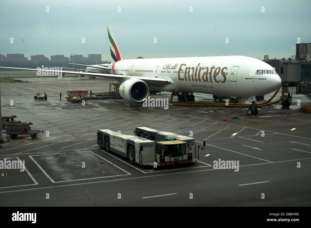 Fly Emirates boeing 777 docking in Beijing International airport Stock  Photo - Alamy