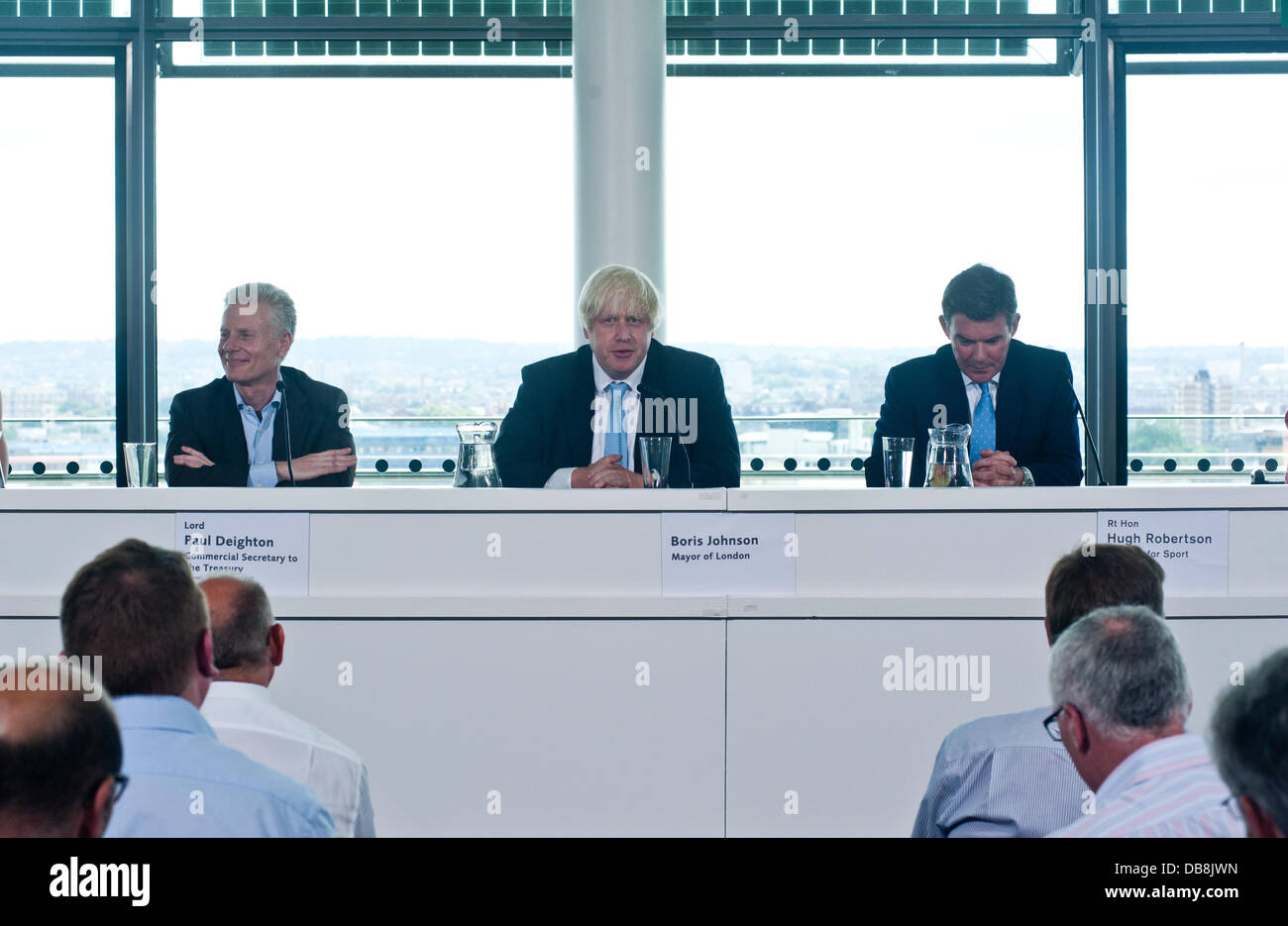 London, UK - 25 July 2013: Mayor of London, Boris Johnson (C); Minister for Sport and Tourism, Rt Hon Hugh Robertson (R) and Commercial Secretary to the Treasury and former LOCOG CEO, Lord Paul Deighton (L) discuss the Legacy of London’s Olympic and Paralympic Games Credit:  Piero Cruciatti/Alamy Live News Stock Photo