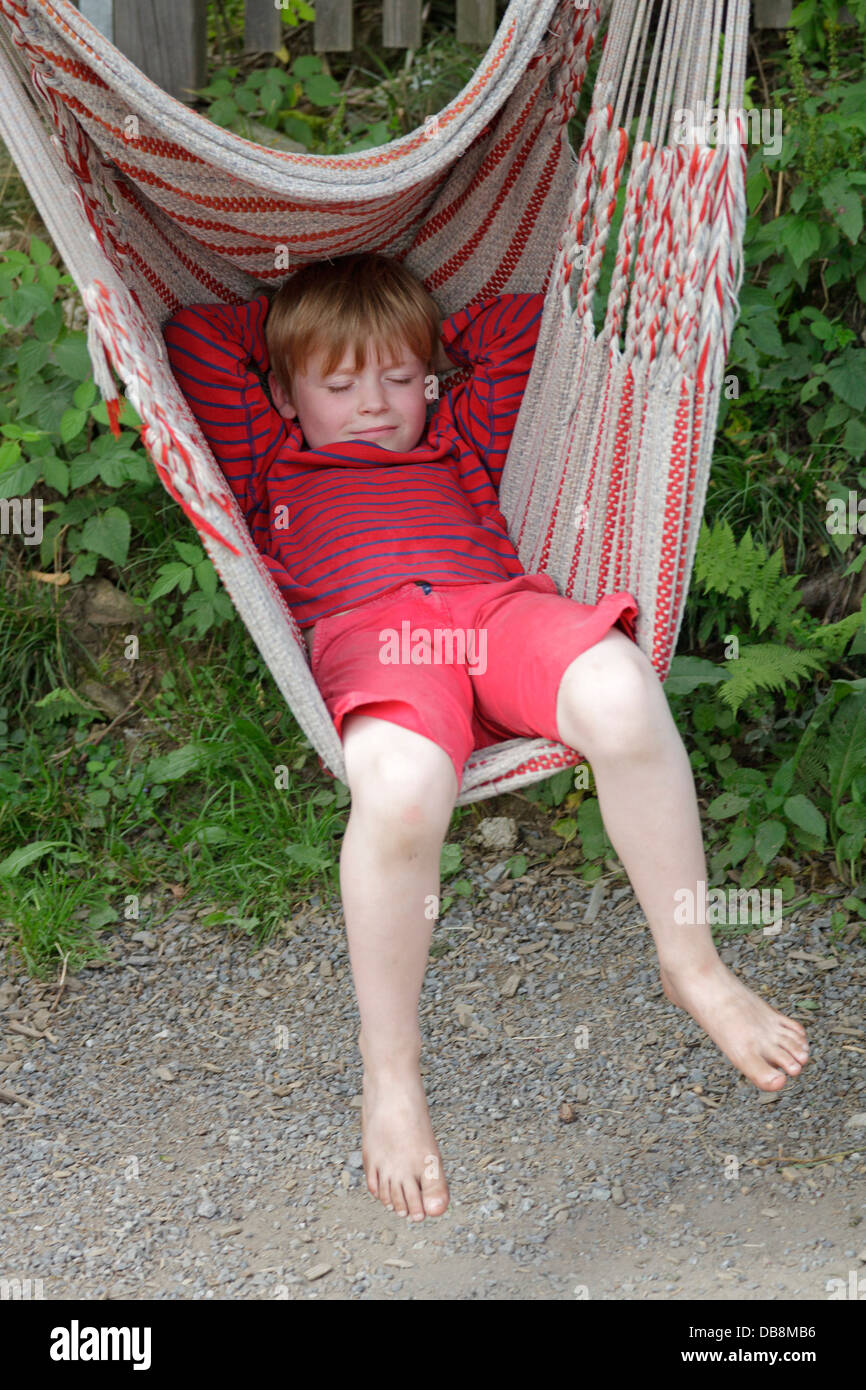 young boy in a hammock Stock Photo