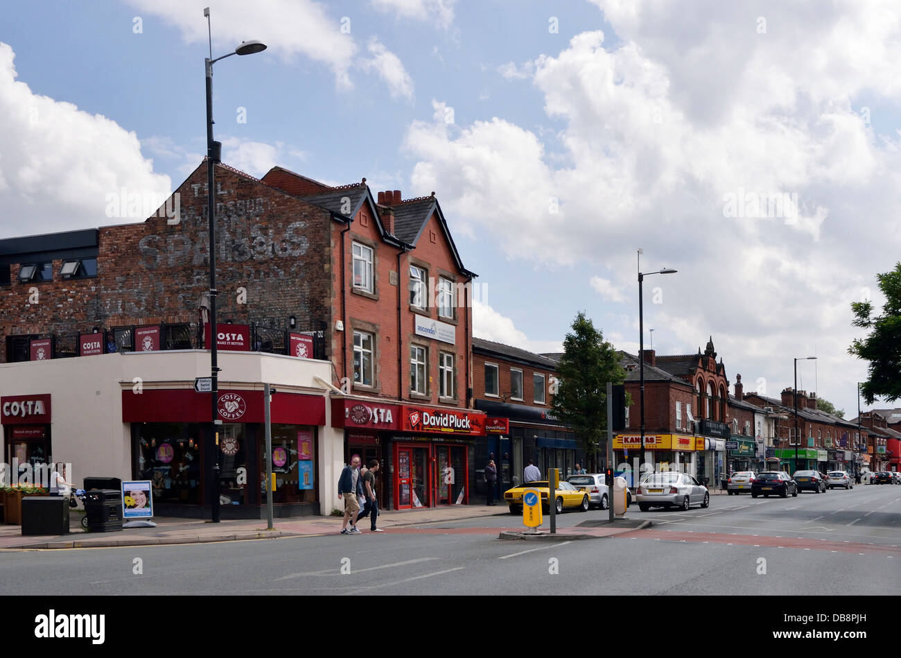 wilmslow road in didsbury village, a surburb in south manchester, uk