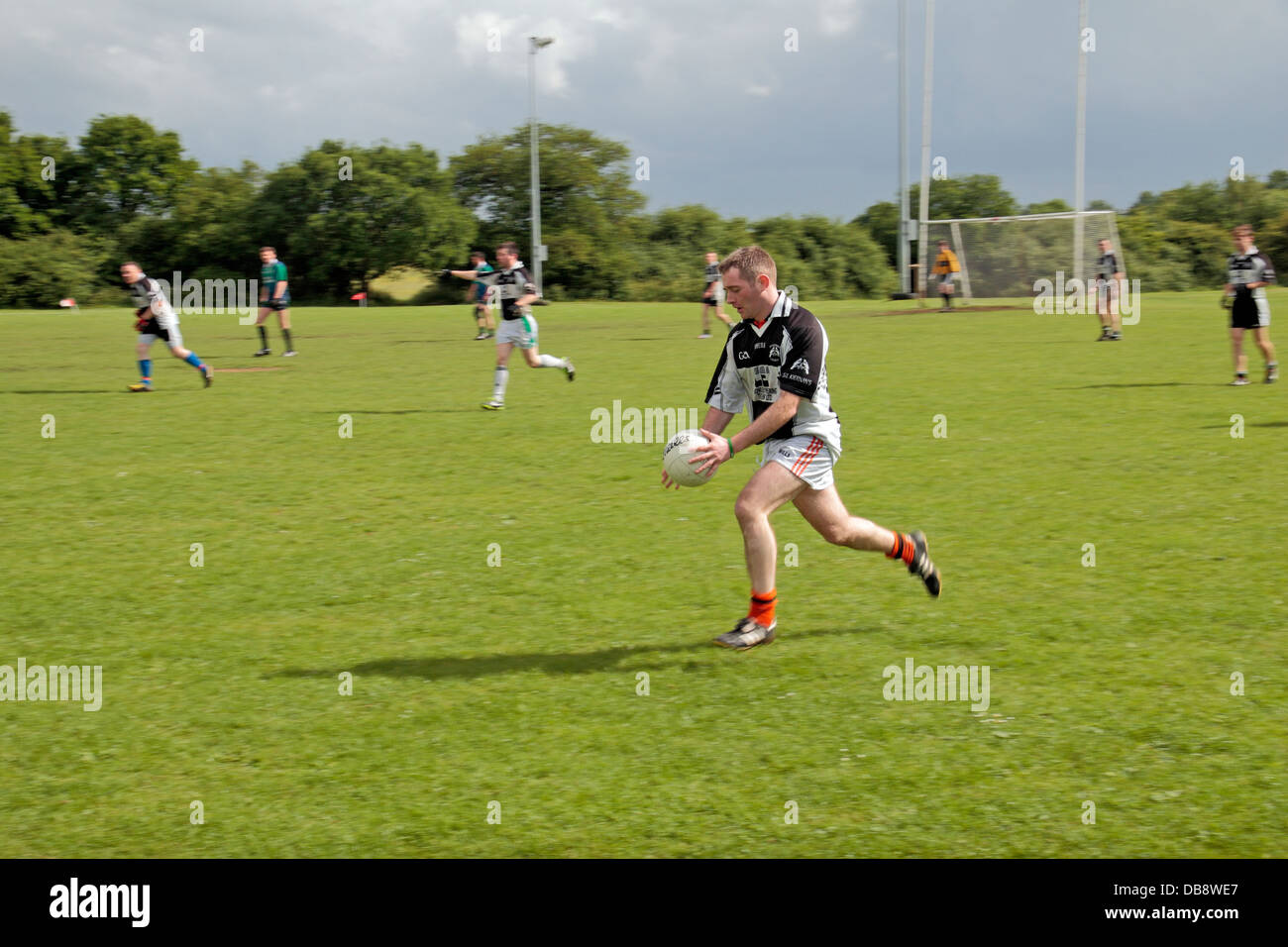 Men playing Gaelic sports (Gaelic football) being played in England at