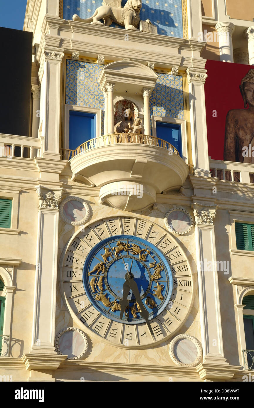 Sunny portrait blue clock, ornate facade, St.Mark's Square Clock Tower replica, Resort
