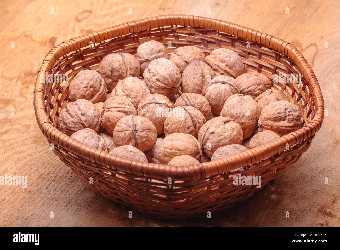 Basket full of walnuts Stock Photo Alamy