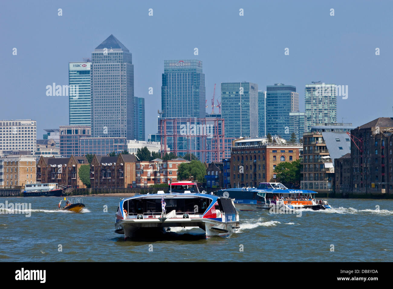 Thames Clipper River Bus and Canary Wharf, London, England Stock Photo
