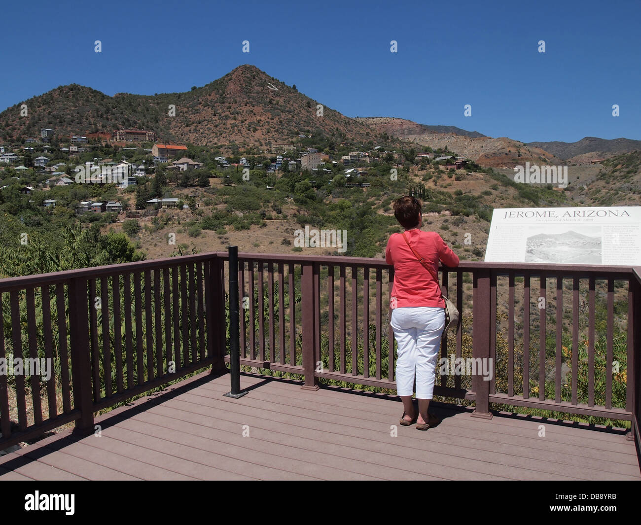 Woman enjoying the view from a tourist outlook in Jerome, Arizona, USA Stock Photo